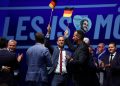 Supporters of far-right Alternative for Germany (AfD) hold German flags after polls closed in the Saxony-Anhalt state elections, in Magdeburg, Germany, September 6, 2026.
